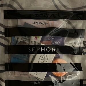 - Sephora Skincare and Beauty Collection in Black Striped Bag